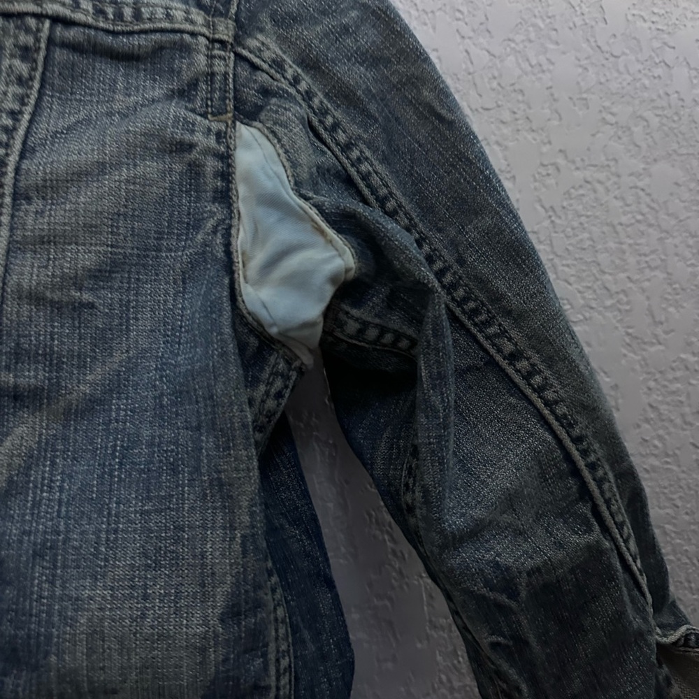 Diesel Blue Jeans with Contrast Stitching and Distressed Look